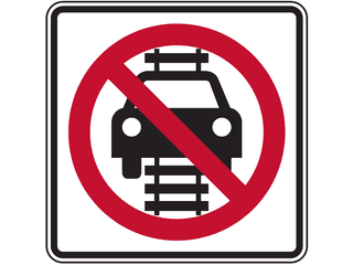 Sign: No Vehicles On Tracks