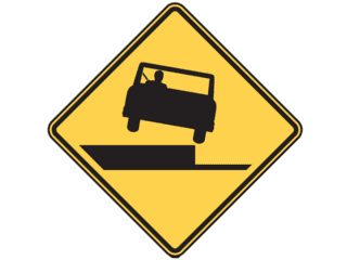 Sign: Shoulder drop off 